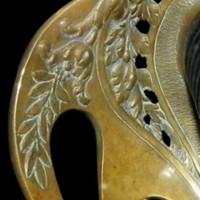 Détail des branches de laurier (sabre du Commandant Caud)