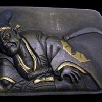 Seigneur (détail du <em>menuki</em>&nbsp;<em>Bras de fer</em>)